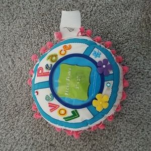 Photo frame pillow. Holds 3x3" photo